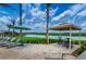 Relaxing poolside amenities overlooking the lake within the community at 4962 Windermere Ave, Kissimmee, FL 34746
