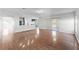 Open floor plan with hardwood floors, recessed lighting, and a modern kitchen at 5456 Crepe Myrtle Cir, Kissimmee, FL 34758