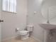 Comfortable half bath features a pedestal sink at 6475 New Independence Pkwy, Winter Garden, FL 34787