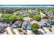 An aerial view showcases the neighborhood featuring manicured lawns and tree-lined streets at 6921 Blair Dr, Orlando, FL 32818