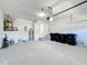 Spacious two-car garage with painted floors and ample room for storage at 6921 Blair Dr, Orlando, FL 32818