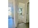 Entryway showcasing tile flooring with a view into the bedroom, creating a sense of openness and flow at 992 Serchio St, Haines City, FL 33844
