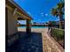 Community pool area featuring a pool, seating and sunshades at 992 Serchio St, Haines City, FL 33844