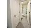 Hallway bathroom featuring ceramic tile floors, a toilet, bathtub, and shower featuring a shower curtain at 994 King Parc Rd, Orange City, FL 32763