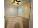 Bedroom with a ceiling fan, a window with blinds, neutral wall paint and carpet flooring at 994 King Parc Rd, Orange City, FL 32763