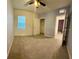 Bedroom with a ceiling fan, a window with blinds, neutral wall paint and carpet flooring at 994 King Parc Rd, Orange City, FL 32763