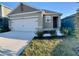 Attractive single-story home with a two-car garage, offering curb appeal at 994 King Parc Rd, Orange City, FL 32763