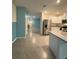 Bright kitchen with stainless steel appliances, granite countertops, and tile flooring at 994 King Parc Rd, Orange City, FL 32763