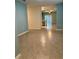 Bright living room featuring tiled flooring and an open floor plan with lots of natural light at 994 King Parc Rd, Orange City, FL 32763