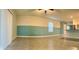 A spacious living room with tile floors and natural light featuring modern blinds at 994 King Parc Rd, Orange City, FL 32763