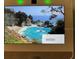 A vibrant coastal image displayed on a modern smart screen, showcasing natural beauty and advanced technology at 994 King Parc Rd, Orange City, FL 32763