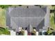 An aerial view of townhomes showing roof detail and landscaping at 10785 Corsican St # 3, Orlando, FL 32824