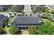 Aerial view of community townhomes with lush landscaping at 10785 Corsican St # 3, Orlando, FL 32824