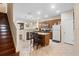 Well-equipped kitchen featuring stainless appliances, center island, and an open design at 10785 Corsican St # 3, Orlando, FL 32824