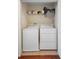 Convenient laundry room equipped with a washer and dryer at 10785 Corsican St # 3, Orlando, FL 32824