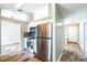 Modern kitchen featuring stainless steel appliances and a grey subway tile backsplash at 1456 Providence Blvd, Deltona, FL 32725