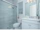 Modern bathroom with a glass-enclosed shower and white vanity at 14691 Walcott Ave, Orlando, FL 32827