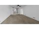 Bedroom showcasing neutral carpet with an en-suite bathroom at 151 E Washington St # 419, Orlando, FL 32801