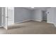 Bedroom featuring neutral carpet and ample natural light at 151 E Washington St # 419, Orlando, FL 32801