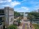 Beautiful view of Lake Eola from the Metropolitan building featuring palm trees and a fountain at 151 E Washington St # 419, Orlando, FL 32801