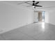 Spacious living room featuring marble floors and a ceiling fan at 151 E Washington St # 419, Orlando, FL 32801