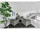 Inviting lobby with modern seating area, tile floors, and staircase access at 151 E Washington St # 419, Orlando, FL 32801