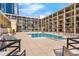 This outdoor community pool offers lounge seating and a great place to relax at 151 E Washington St # 419, Orlando, FL 32801