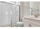 Bright bathroom featuring a tile shower and quartz counters at 18381 Oliver Twist Way, Winter Garden, FL 34787