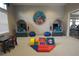 Whimsical room with themed decor, padded play area, and cozy reading nooks, perfect for entertainment and relaxation at 18381 Oliver Twist Way, Winter Garden, FL 34787