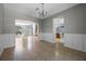 Open dining space with archway access to the foyer and kitchen at 2204 Hammock Moss Dr, Orlando, FL 32820