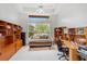 Secondary bedroom that can also function as a home office, showcasing natural light at 2733 Deer Berry Ct, Longwood, FL 32779