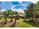 Beautiful home with meticulously manicured landscaping and stately palm trees at 2733 Deer Berry Ct, Longwood, FL 32779