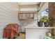 View of the outdoor kitchen area featuring cabinets, sink, tiled counter, and covered grill at 2733 Deer Berry Ct, Longwood, FL 32779