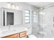 Beautifully renovated bathroom featuring walk-in shower and modern fixtures at 2952 Ashwood Ct, Apopka, FL 32703