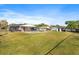 Expansive backyard with pool, patio area, and storage shed, ideal for outdoor living at 337 Ohio Ave, St Cloud, FL 34769