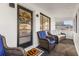 Welcoming front porch with comfortable seating, a decorative wreath on the door, and plenty of natural light at 337 Ohio Ave, St Cloud, FL 34769