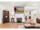 Cozy living room with decorative fireplace, large TV, and easy flow to the dining area. A warm and inviting living space at 337 Ohio Ave, St Cloud, FL 34769