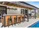 Entertainer's delight with a custom outdoor bar by the pool and covered patio seating at 337 Ohio Ave, St Cloud, FL 34769