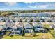 Aerial view showcasing the neighborhood, homes, and scenic landscaping at 3964 Lightning Ct, Sanford, FL 32773