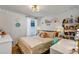 Bedroom featuring a soft bed, vanity desk, and window providing natural light at 3964 Lightning Ct, Sanford, FL 32773