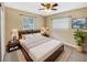 Serene main bedroom with a king-size bed, soft lighting, and a calming color palette for a restful retreat at 46 Morning Glory Dr, Debary, FL 32713