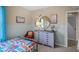 Bright bedroom with eclectic decor and a comfortable single bed at 4946 Foxglove Cir, Lakeland, FL 33811