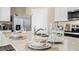 Close up of a kitchen island featuring place settings, decor, and stainless steel sink and faucet at 5223 Ligonberry St, Lakeland, FL 33811