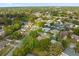 Wide aerial shot of the neighborhood, full of mature trees, houses, and quiet roads at 520 Balsawood Ct, Altamonte Springs, FL 32714