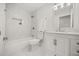 Renovated bathroom with white marble tile and modern fixtures at 520 Balsawood Ct, Altamonte Springs, FL 32714