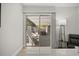 Bright living room featuring a sliding glass door with access to the screened in patio and neutral walls at 520 Balsawood Ct, Altamonte Springs, FL 32714