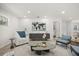 Comfortable living room featuring modern decor, neutral tones, and recessed lighting at 520 Balsawood Ct, Altamonte Springs, FL 32714