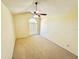 Light bedroom with plush carpeting, vaulted ceiling, ceiling fan, and natural light from a window at 527 Huxford Ct, Lake Mary, FL 32746