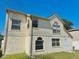 Exterior view of the home featuring a combination of siding and stucco with neutral trim at 527 Huxford Ct, Lake Mary, FL 32746