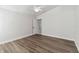 Bedroom featuring wood flooring and a ceiling fan at 5600 Revelwood Loop, Winter Park, FL 32792